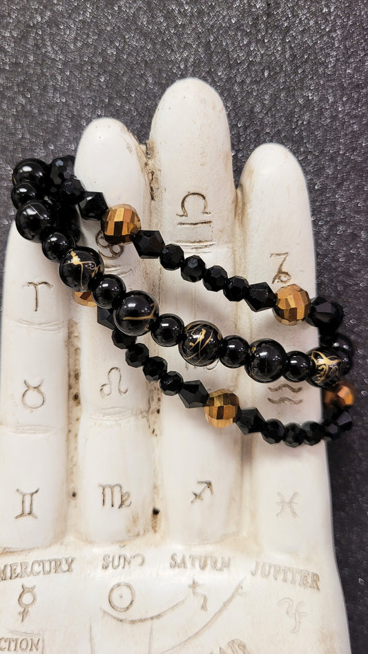 Stackable Black And Gold Glass Beaded Elastic Bracelet Set