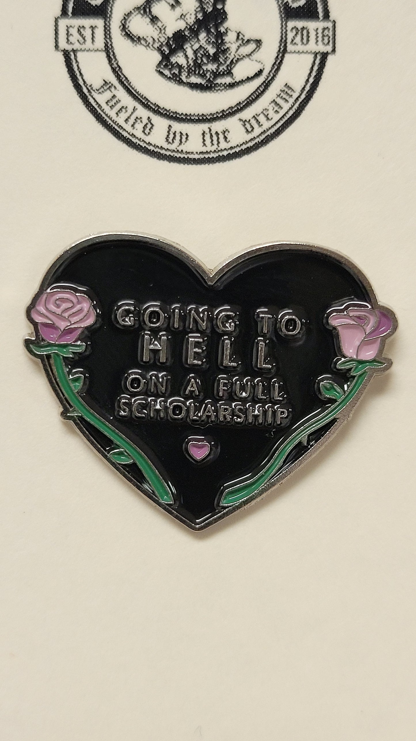 Going to hell on a full scholarship enamel pin